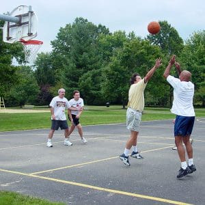 Men playing basketball at Juilfs Park