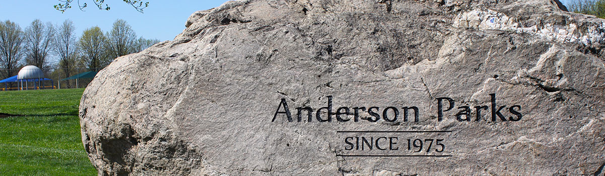 large boulder at Juilfs Park entrance that reads 'Anderson Park Since 1975"