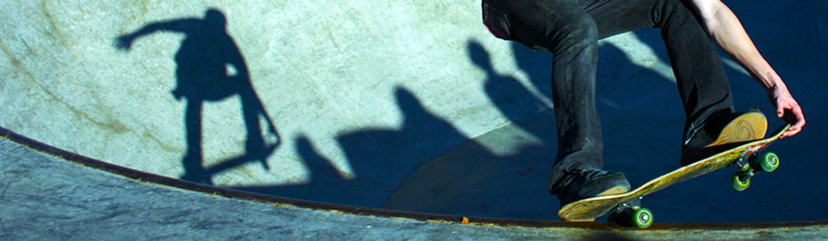 Close up of skateboarder's feet and board at the Beech Acres Park Skatepark