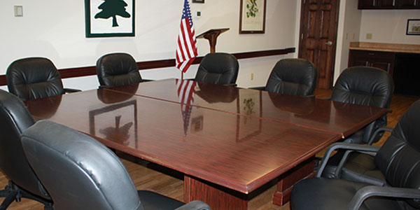 Juilfs Park board room with table and black executive chairs